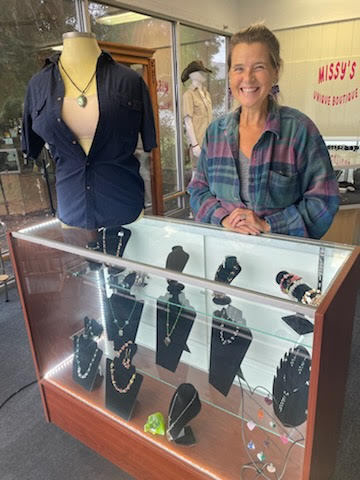 Missy behind jewelry counter